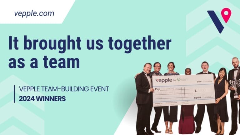 A green Vepple branded background with the navy logo in the top right. In the foreground is a cut out of the winners holding their giant cheque at the awards do. To the left is some text that reads 'It brought us together as a team'