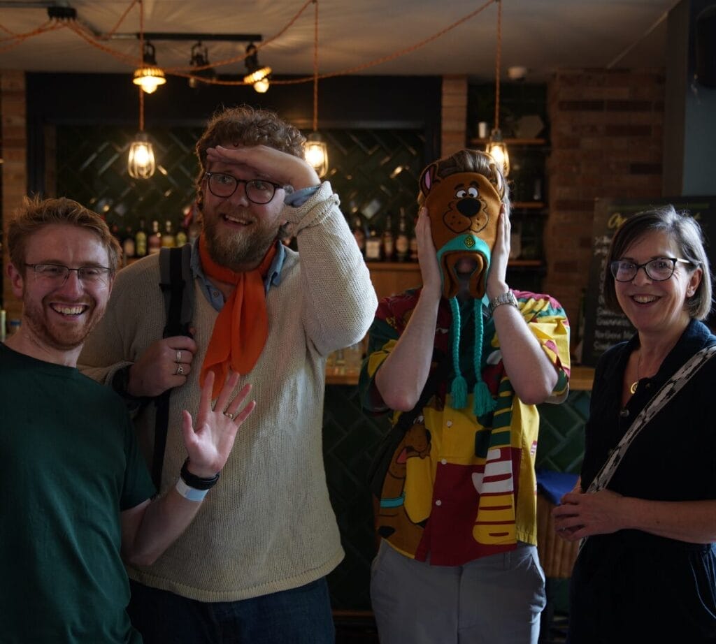 A team photo of University of Bradford, with 4 of their players posing.
